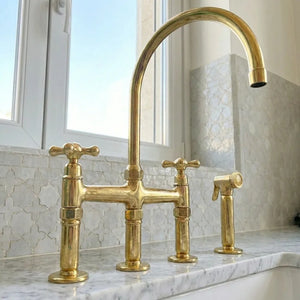 Unlacquered Brass Three-Hole Bridge Kitchen Faucet with Side SprayerUnlacquered Brass Three-Hole Bridge Kitchen Faucet with Side Sprayer