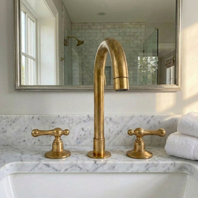 Unlacquered Brass Widespread Vanity Faucet with Lever HandlesUnlacquered Brass Widespread Vanity Faucet with Lever Handles