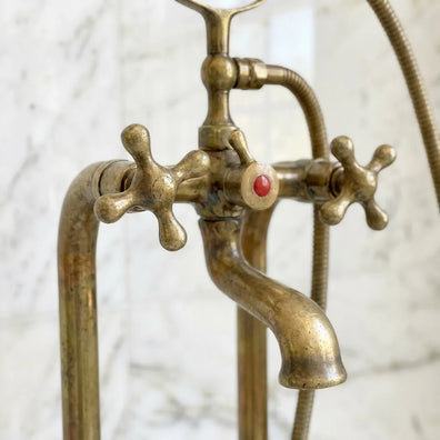 Vintage Antique Brass Freestanding Tub Filler with Handheld Shower - Solid Brass Floor Mount Bathtub FaucetVintage Antique Brass Freestanding Tub Filler with Handheld Shower