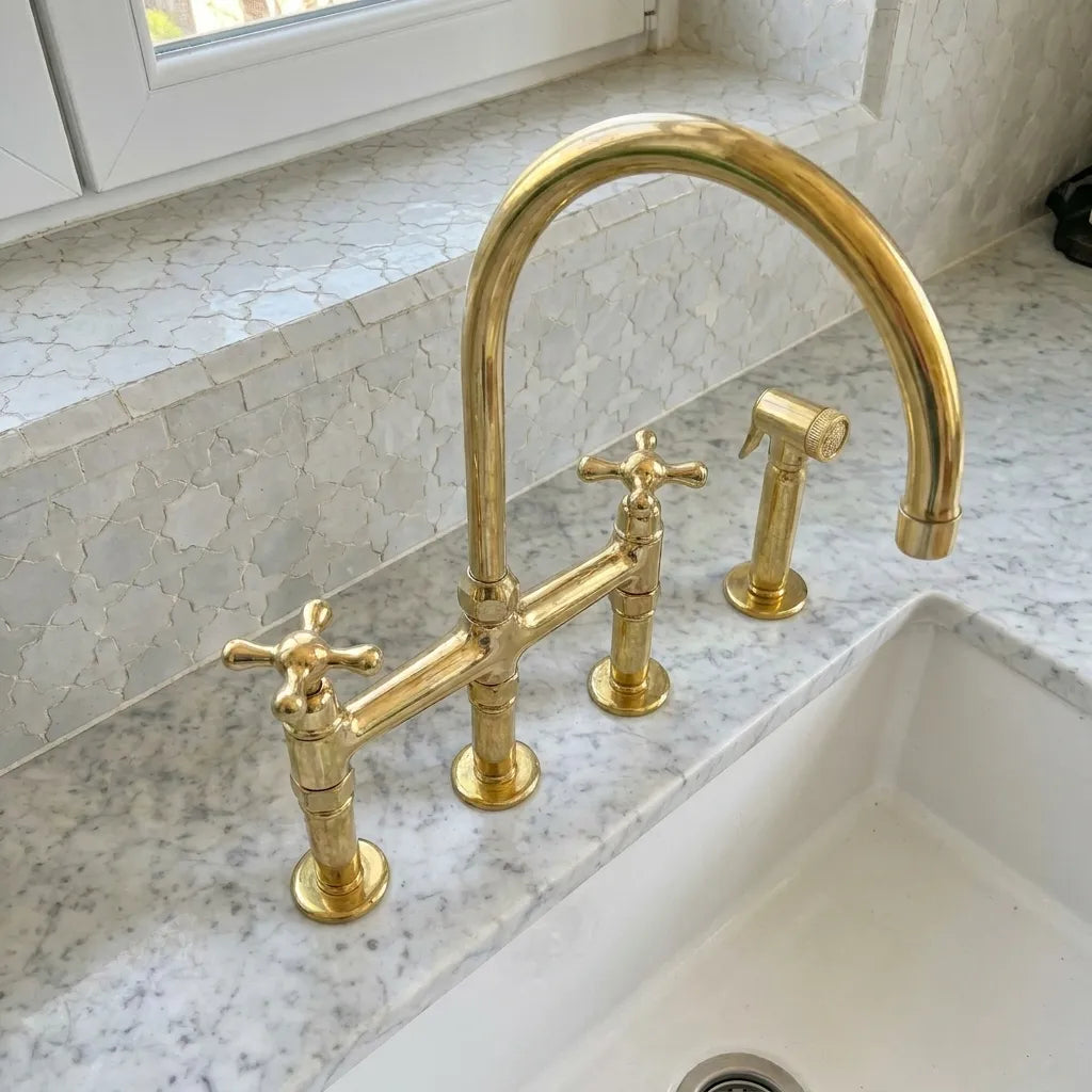 Unlacquered Brass Three-Hole Bridge Kitchen Faucet with Side SprayerUnlacquered Brass Three-Hole Bridge Kitchen Faucet with Side Sprayer