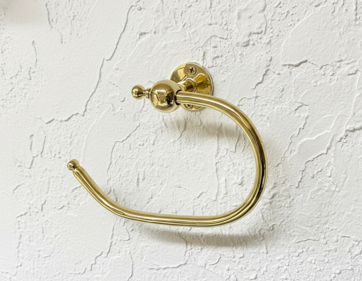 unlacquered brass toilet paper holder – vintage wall-mounted bathroom hardware with solid brass finish.