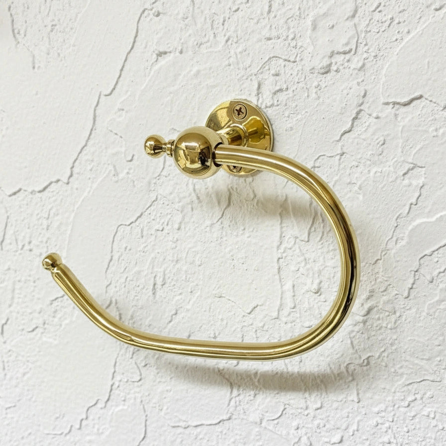 Handmade unlacquered brass toilet paper holder – vintage wall-mounted bathroom hardware with solid brass finish.