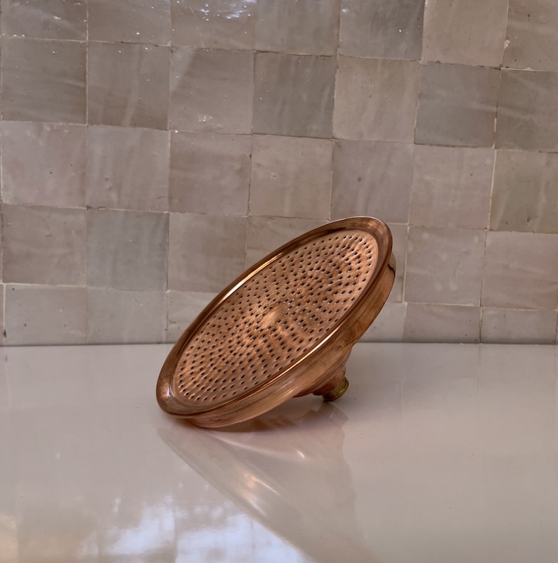 Unlacquered outdoor copper shower head