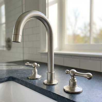 Unlacquered Brass Widespread Vanity Faucet with Lever HandlesUnlacquered Brass Widespread Vanity Faucet with Lever Handles