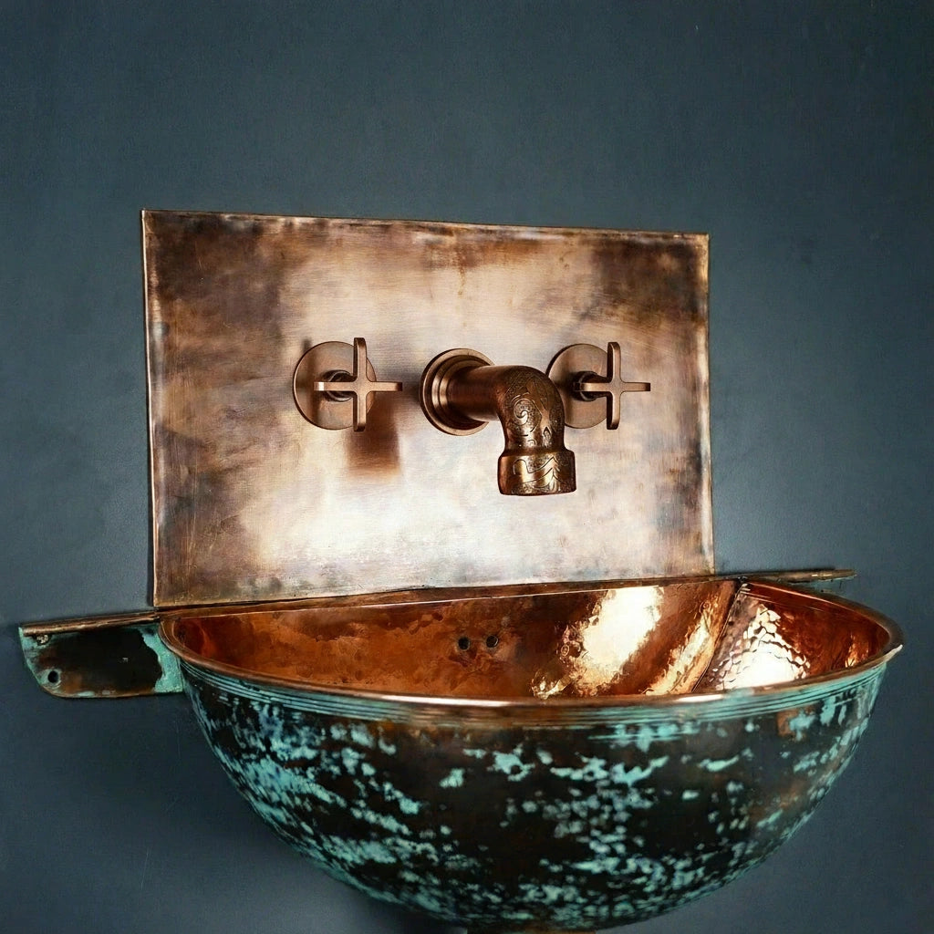 Copper wall-mounted sink with faucet on a dark background