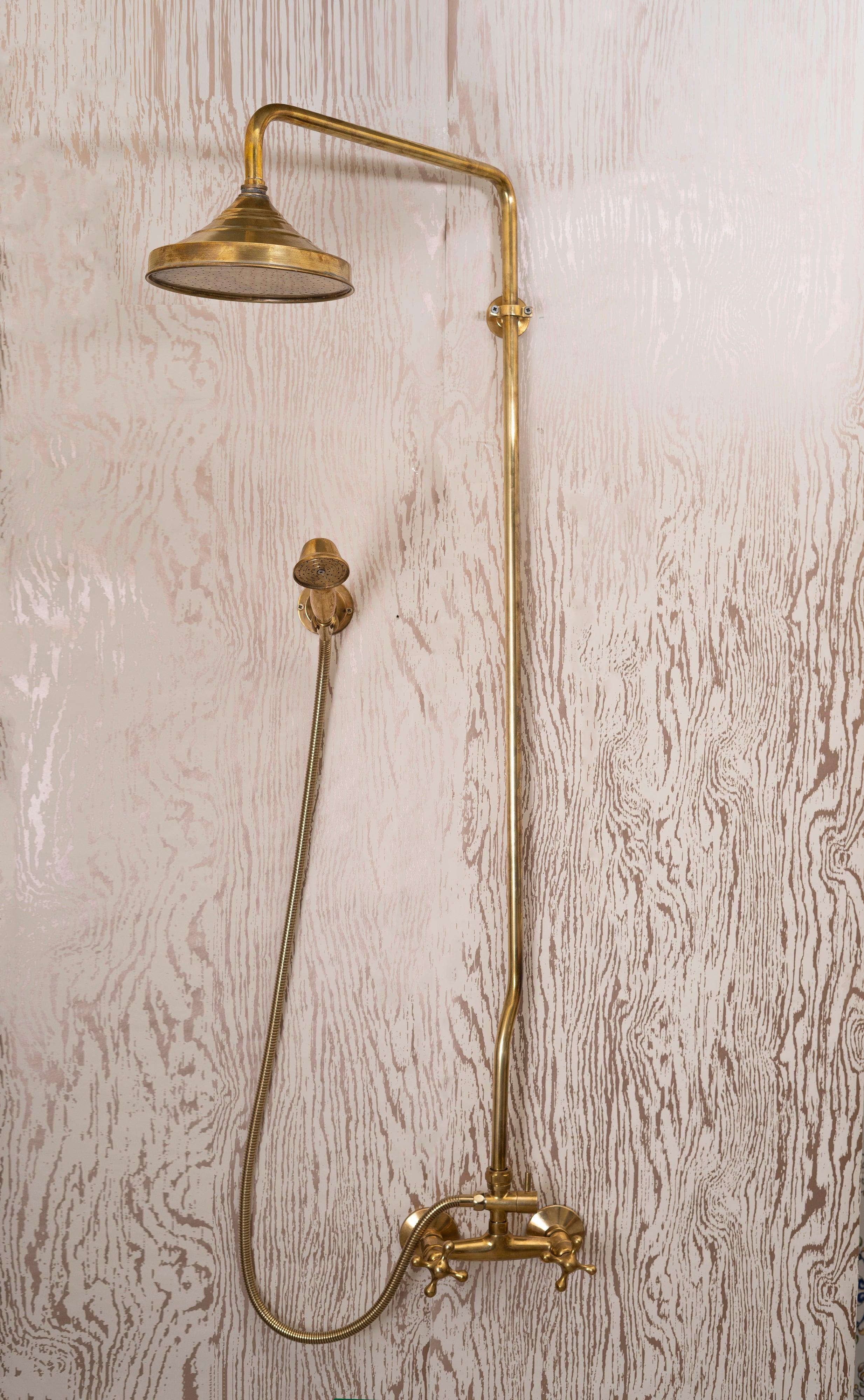 Full unlacquered brass exposed shower system with round rain head, hand shower and cross-handle mixer
