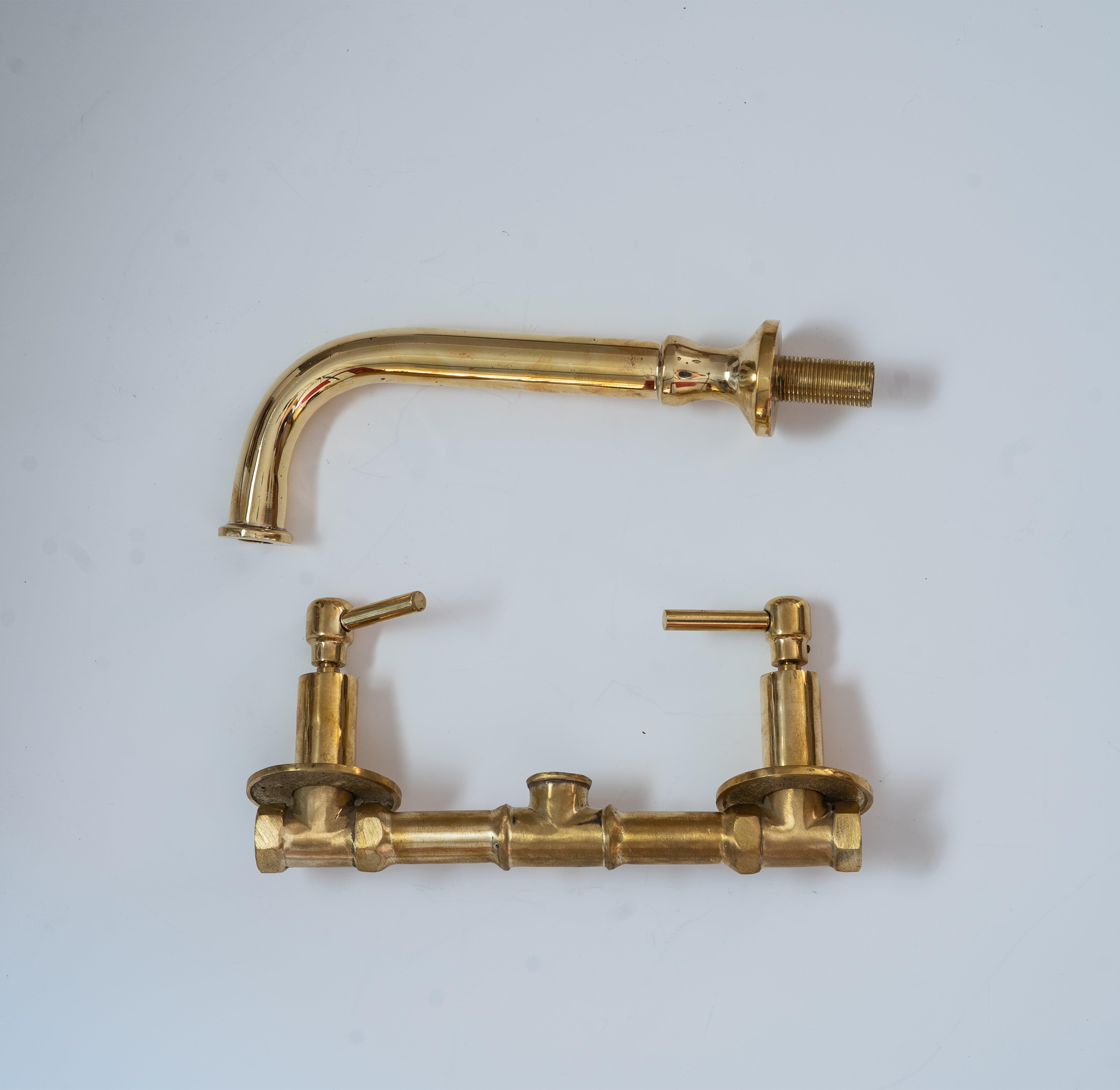 Solid brass wall-mount bathroom faucet parts with curved spout and lever handles