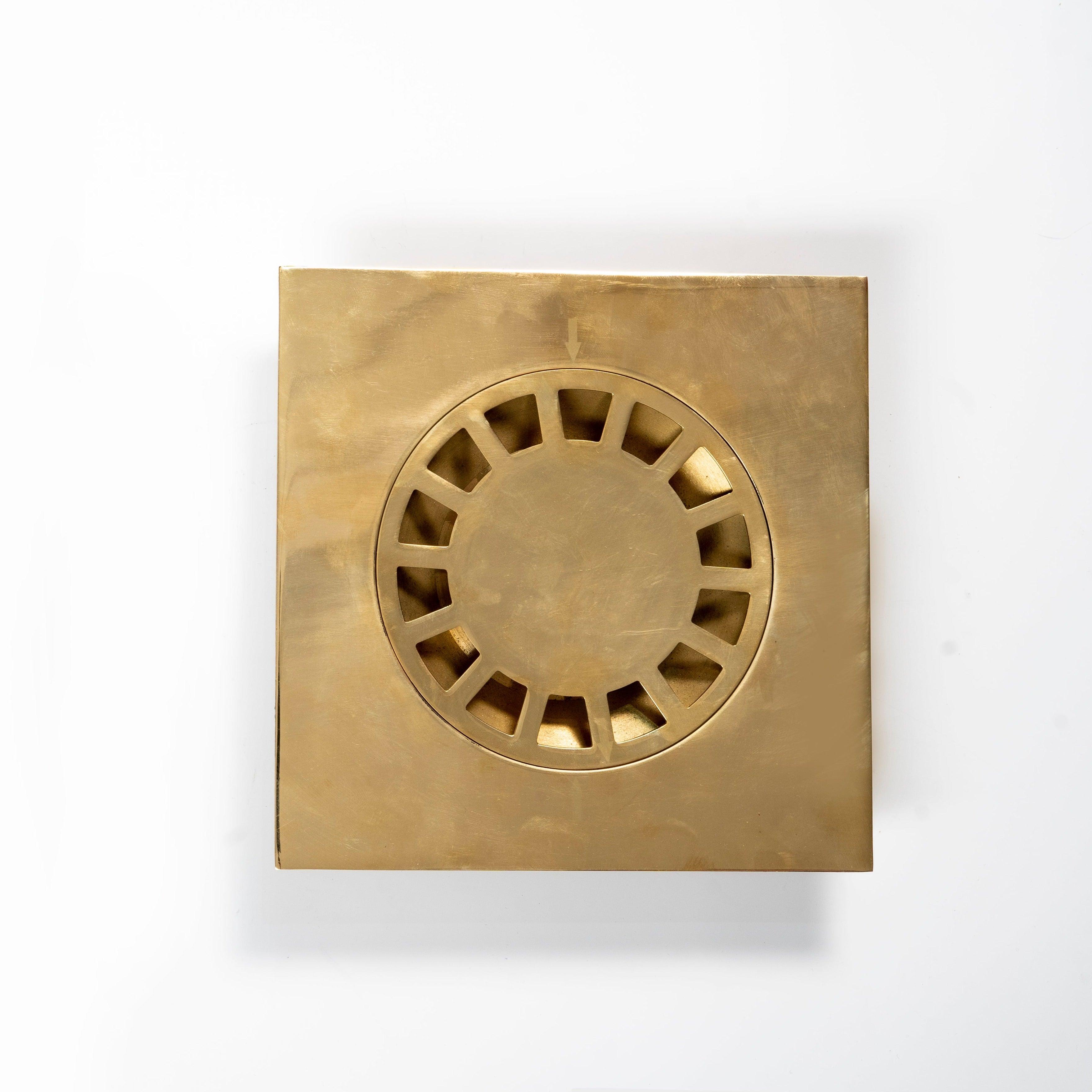 Solid unlacquered brass square shower floor drain with removable slotted cover