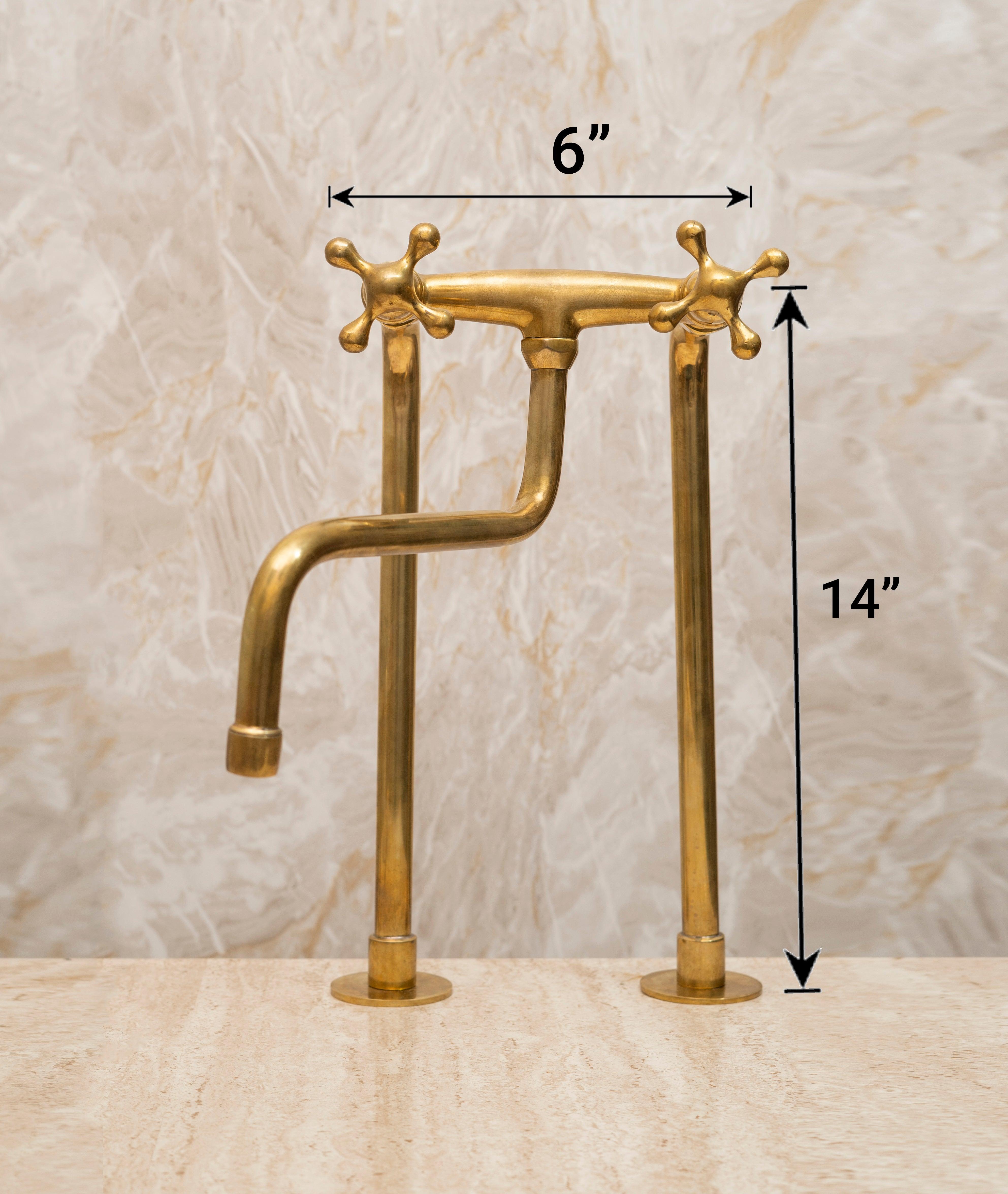 Tall unlacquered brass bridge kitchen faucet measuring 6 inches wide and 14 inches high
