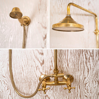 Unlacquered brass shower system showing round rain head, hand shower and exposed mixer details